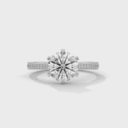 Elegant Round-Cut Diamond Ring with Pavé Band