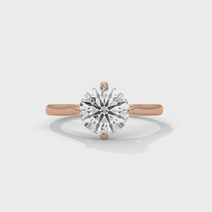 Sleek Tapered Band Solitaire Ring with Round Diamond