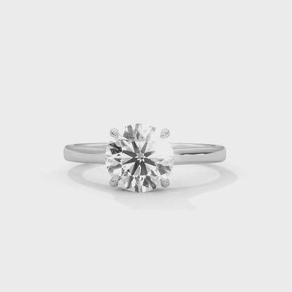 Lustrous Clarity – Classic Diamond Solitaire Ring